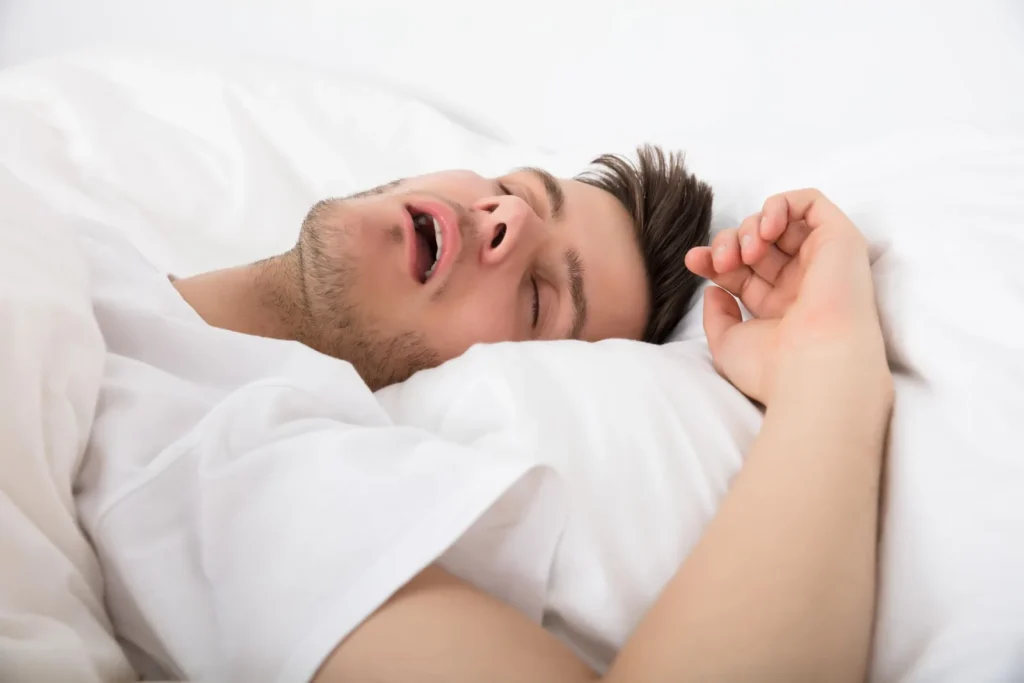 Man snoring while sleeping